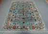 Modern floral area rug in cozy interior setting
