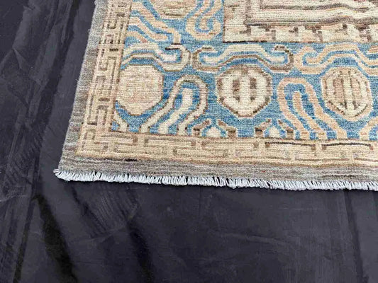 Corner design detail on 6x8 Blue Khotan Oriental Rug