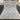 Full layout of 7x10 hand-knotted blue Khotan rug