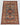 Turkish blue wool rug styled on hardwood floor – boho decor