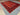 Boho interior floor decor featuring vintage red and black Turkish Kilim rug – wool flatweave.