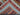 Folded view of vintage kilim carpet with nomadic boho-style patterns