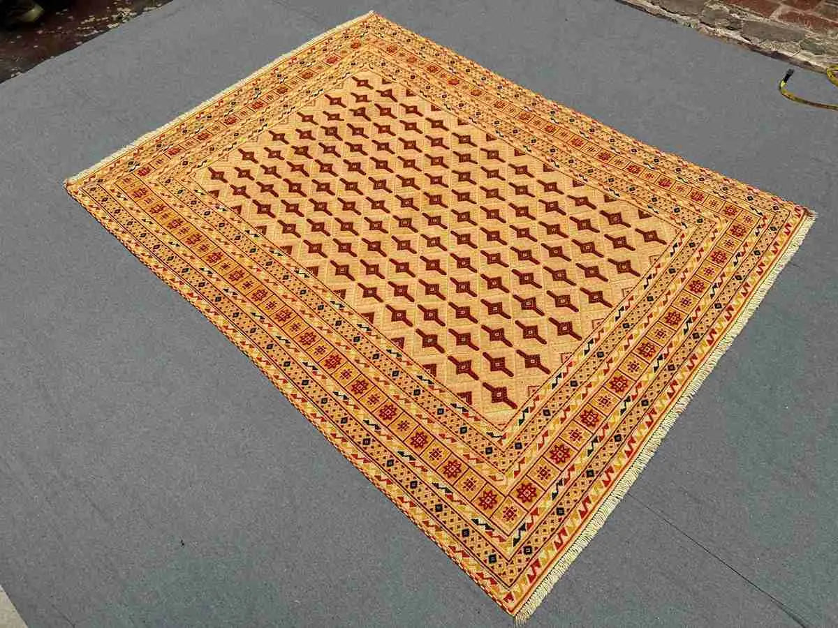 Bohemian oriental interior decor with vintage wool Afghan kilim rug