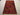 Handwoven Baluchi tribal rug on floor in a bohemian-style room
