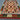 Geometric rug flat on wood flooring