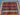 Detailed tribal geometric patterns on bohemian wool rug