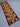 Boho-style Kilim runner rug with red and green diamonds on floor