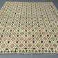 Boho-style handmade Kilim flatweave rug in natural tones – perfect for bedrooms or lounges.