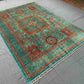 Floor view of bold color handmade Mamluk rug with traditional design