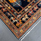 Border design of Tree of Life dark blue area rug