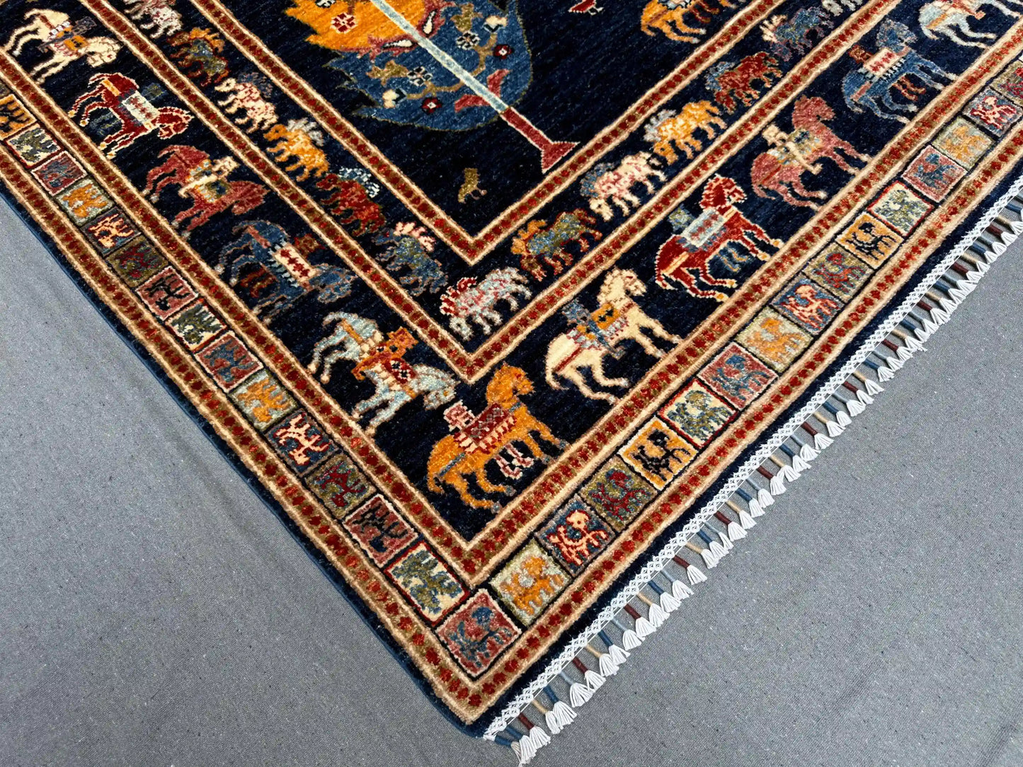 Border design of Tree of Life dark blue area rug