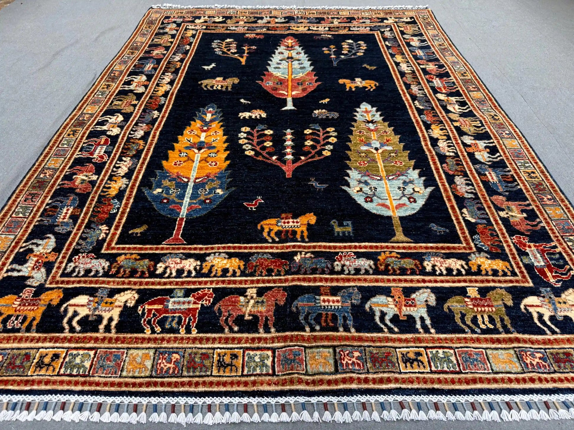 Botanical motif on handmade Tree of Life wool rug