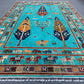 Close-up of botanical motif on Tree of Life handmade wool rug