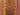 Close-up of camel motif and tribal pattern on wool Afghan runner rug