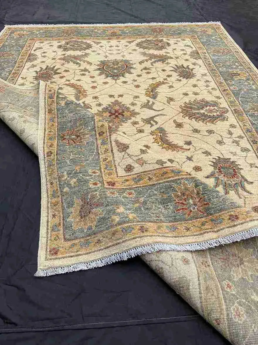 Folded view showing wool thickness of handmade Chobi rug