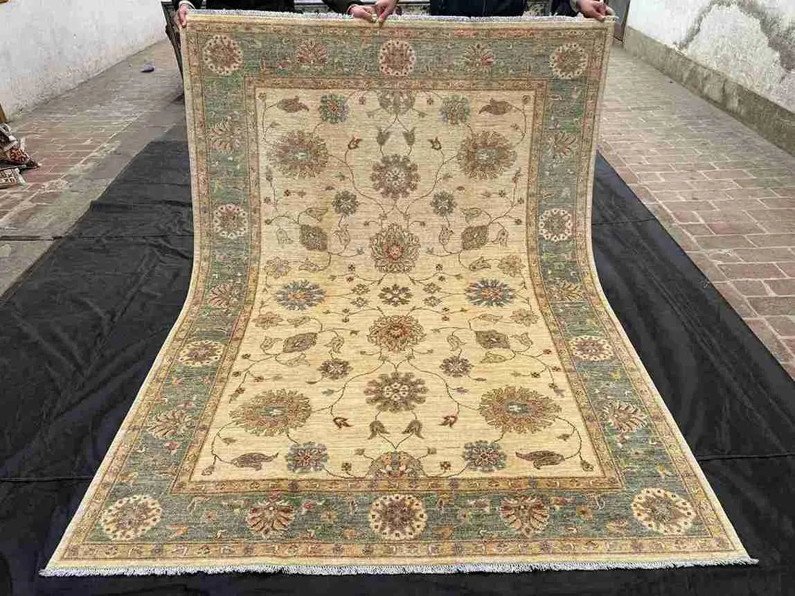 Top view of full handmade Chobi wool rug 6x8 ft with floral design