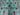 Close-up of floral design on handmade aqua blue wool Sultani rug