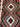 Close-up of red & green wool flatweave pattern on handmade Kilim runner