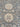Close-up of floral medallion pattern on 9x12 blue and beige Turkish rug