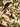 Close-up of parrot and floral motif on silk wall tapestry rug.