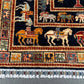Close-up of horse motif on dark blue Tree of Life wool rug