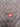 Close-up view of geometric pattern on handmade Baluchi wool rug