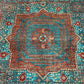 Close-up of geometric Mamluk rug pattern in turquoise, red, and green