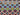 Close-up of 4x6.1 ft handmade kilim rug – colorful diamond patterns in wool