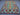 Close floor shot of colorful wool tribal Kilim rug – handwoven