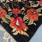 Corner detail showing fine wool flatweave and traditional floral pattern