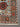 Corner detail of vintage Oriental Turkish area rug in red and blue