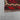 Corner detail of vintage Afghan Kilim rug – small red wool flatweave with knotted tribal accents.