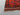 Corner detail of vintage red and black Turkish Kilim rug – tribal knotted wool flatweave.