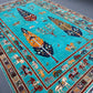 Corner view of Tree of Life rug on wooden floor