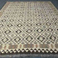 Beige and brown earth-tone Kilim rug close-up – 8x10 size with traditional geometric design.