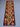 Red and green Kilim runner rug styled on floor – 2x6.4 ft