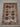 Handmade Turkish area rug displayed on floor in living room setting