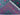 Folded view of knotted green & red Afghan Turkish rug