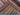Folded wool Art Deco rug showing soft wool texture