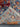 Folded view of blue Garden of Babylon Persian-style rug