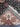 Folded view of cream Afghan Sultani handmade Oriental rug