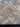 Folded front view of 9x12 red and blue Turkish Oushak rug