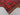 Folded 8x12 vintage Turkish Kilim rug – red and black wool flatweave with tribal oriental design.