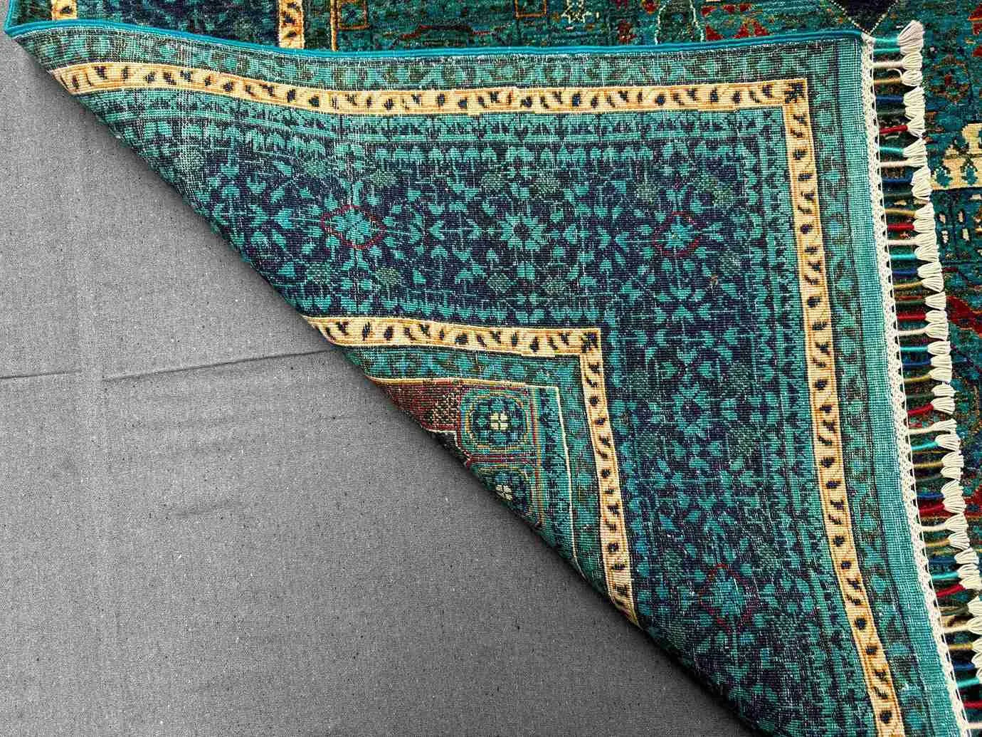 Folded backside of 6x7 Mamluk rug showing hand-knotted structure