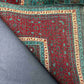 Folded view of 6x8 Oriental Mamluk rug showing weave and texture