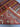 Folded handmade multicolor wool rug with visible knots
