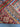 Folded view of colorful striped Khorjin rug showing thickness