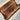 Folded silk Persian wall rug showing backside and texture