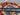 Folded close-up of Blue and Red Turkish rug – 4.11x4.11 ft wool hand-knotted.
