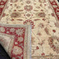 Close-up of folded Persian-style rug showing texture and design